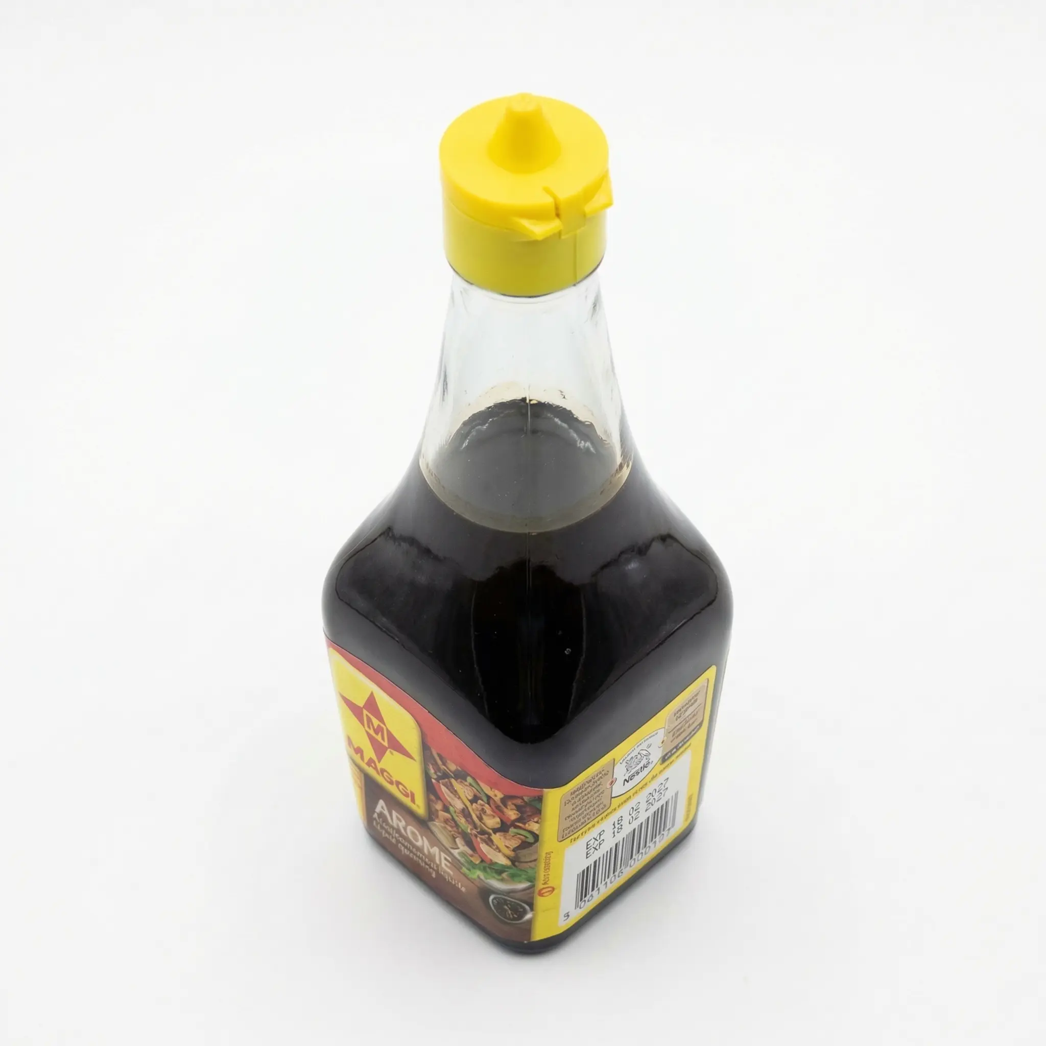 Vue dessus bouchon arôme Maggi 300g, doseur jaune classique